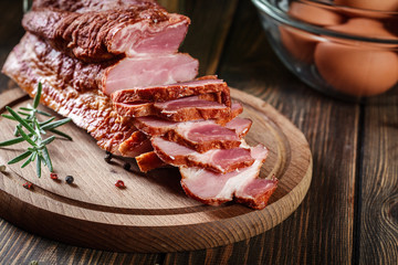 Smoked bacon with chopped slices, ready to prepare a traditional breakfast with eggs