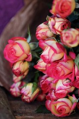 Beautiful bouquet of pink roses on the table 