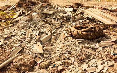 In the dump area outside the city