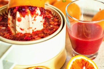 Preparing of red blood orange juice.