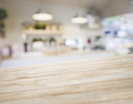 Table top wooden counter Blur Kitchen shelf and lighting background