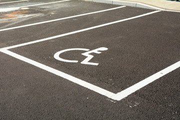 Disabled user car park space with wheelchair symbol