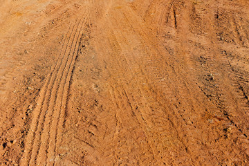 Tired track on the ground.