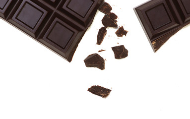 Broken chocolate bar isolated on white