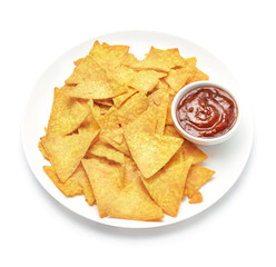 heap of nachos with sauce in plate isolated on white background
