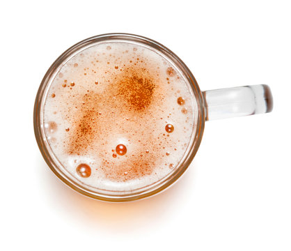 mug of ligt beer with foam isolaed on white background