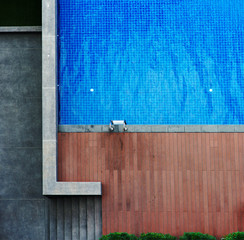 view from the top of the pool in a residential building..