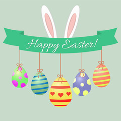 Easter bunny ears, green ribbon and Easter eggs. Congratulations Happy Easter.