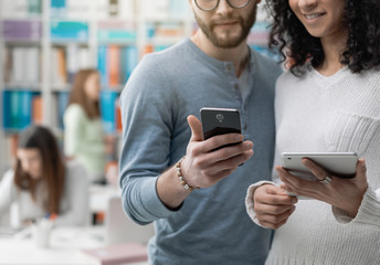 Friends sharing social media contents