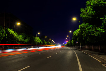 Traffic on the road at night in the city
