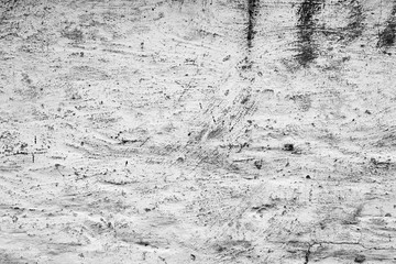 Wall fragment with scratches and cracks