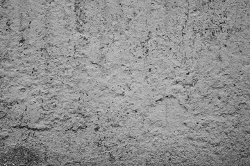 Wall fragment with scratches and cracks