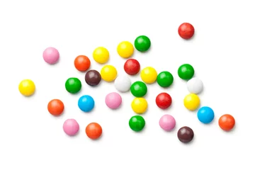 Foto op Plexiglas Colorful Chocolate Candy Pills Isolated on White Background © Bozena Fulawka