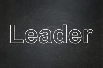 Obraz premium Finance concept: text Leader on Black chalkboard background