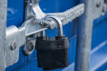 Padlocked doors of a storage container
