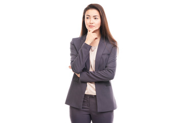 Portrait of emotional Asian businesswoman posing on white background