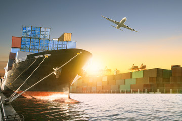 ship and container box and cargo plane flying over shipping dock use for logistic and international...