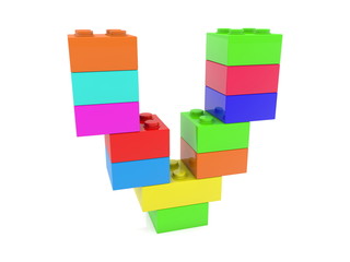 Letter V concept built from toy bricks