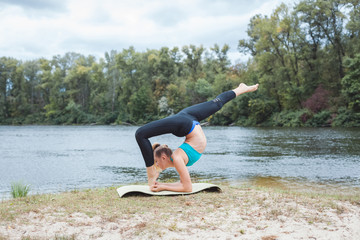 Fototapeta premium Girl is engaged in fitness.