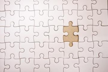 top view. business background white jigsaw with copy space. image for texture, problem, thinking, idea, toy, success, puzzle, game concept