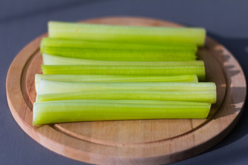 fresh juicy celery closeup on dark background