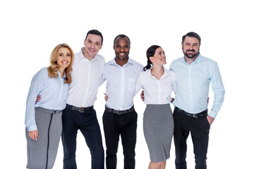Fototapeta premium My dear colleagues. Attractive joyful stylish young successful colleagues smiling and hugging and a brunette looking at the bearded man