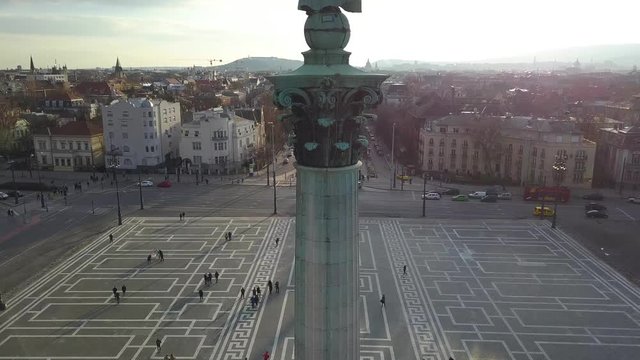 Budapest, Hungary - Aerial 4K footage about drone flying up at Heroes' Square near City Park at winter time