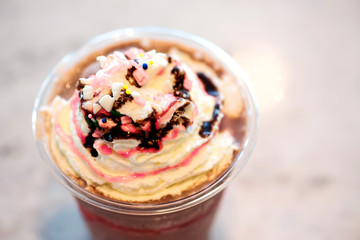 Chocolate smootie with cream and strawberry