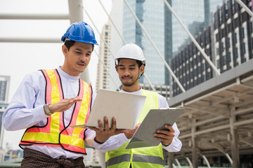 Handsome Myanmar engineer working in city