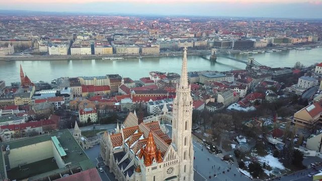 Budapest, Hungary - Aerial 4K drone footage about Matthias Church with Fisherman's Bastion, Parliament of Hungary, River Danube and Szechenyi Chain Bridge at background