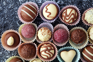 a lot of variety chocolate pralines, belgian confectionery gourmet chocolate.