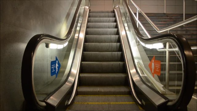 moving escalator up in a public area