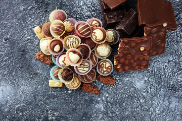 Obraz na płótnie Canvas a lot of variety chocolate pralines, belgian confectionery gourmet chocolate.
