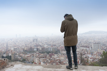 Man with Barcelona view