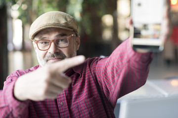 Adult man using smartphone application