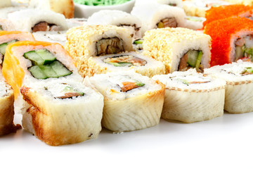 close-up shot of traditional fresh japanese sushi rolls, focus on the front piece