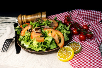 Delicious fresh salad and olive oil