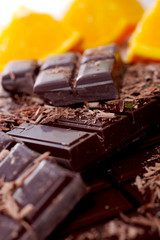 tablet and pieces of dark chocolate