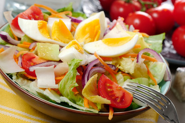 vegetable salad on yellow towel
