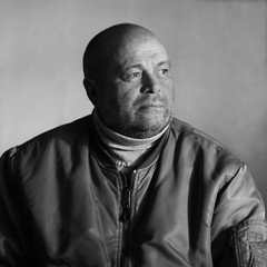 portrait of brutal man who looks into the distance