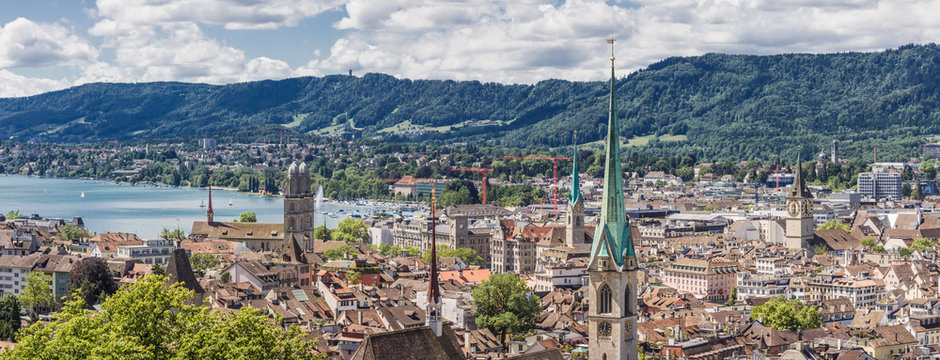 Historic Zurich center with famous Grossm&uuml;nster Church, Limmat river and Z&uuml;richsee, Switzerland. Historisches Zentrum von Z&uuml;rich mit der ber&uuml;hmten Grossm&uuml;nsterkirche, Limmat, Z&uuml;richsee, Schweiz.