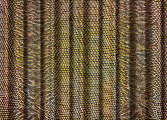 Iridescent snakeskin curtain background