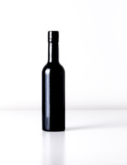 mock-up of a black bottle with white background