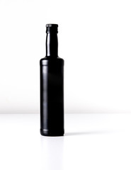mock-up of a black bottle with white background