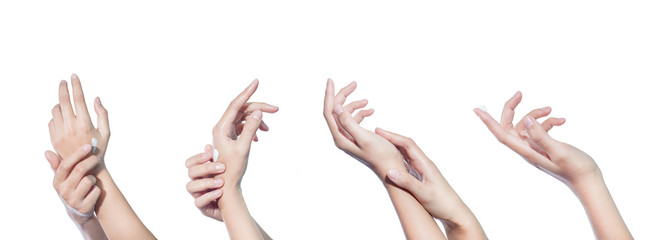 woman isolated on white studio shot applying cream on her hands