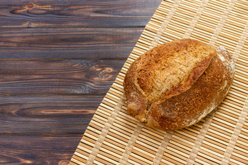 freshly baked bread on rustic wooden table