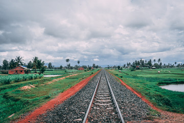 Fototapeta premium Old railway in Cambodia, wetlands