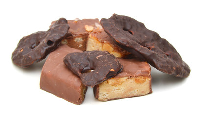  chocolate cookies with peanuts on white