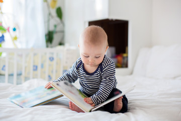 Portrait of a cute  infant baby boy. Happy childhood concept. © Tomsickova