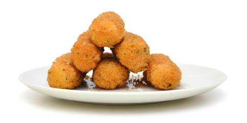 Mozzarella cheese sticks on white plate on white background